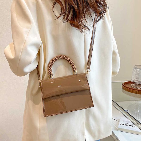 Solid Color PU тренд персонализированный ежедневная сумка для коммутирующей сумки Простая женская стропа с одним плечевым сумкой для портативного комода