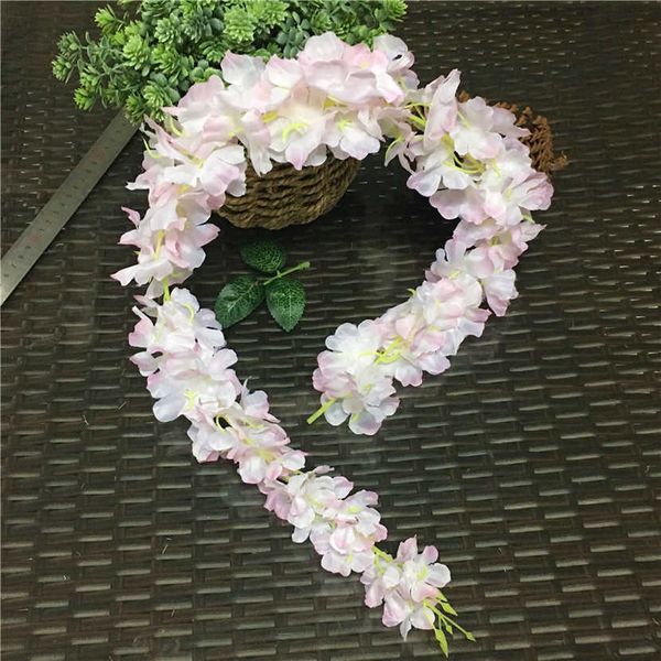 Flores decorativas grinaldas de cerejeira por atacado Flores de cerejeira videiras falsas Sakura Flores artificiais para paredes de decoração de teto de festas Rattan 90cm T230217