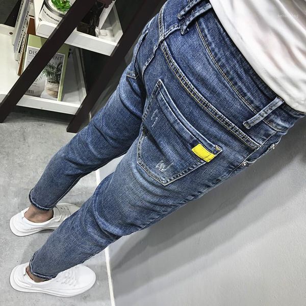 Jeans da uomo all'ingrosso 2023 Tooling Patch lavato blu piccoli piedi ritagliata uomo primavera ed estate Corea Social Guy Youth Pencil