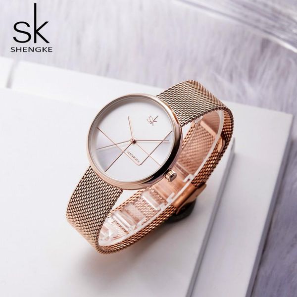 Нарученные часы Shengke Korean Women Women Watch Fashion Exquisite Student Watch Mesh Belt Quartz Элегантный водонепроницаемый роскошный