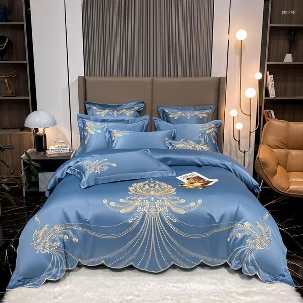 Conjuntos de roupas de cama azul cetim algodão de retalhos de tampa de edredão conjunto 4pcs de luxo bordado de penas douradas colchas colheitas colheres têxteis home têxteis