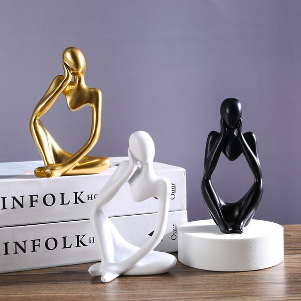 Estátuas decorativas para a sala de estar Sculpture Sculpture Gold Nordic Resin Bookcase Ornamentos para casa Modern Desktop Acessory Thinke