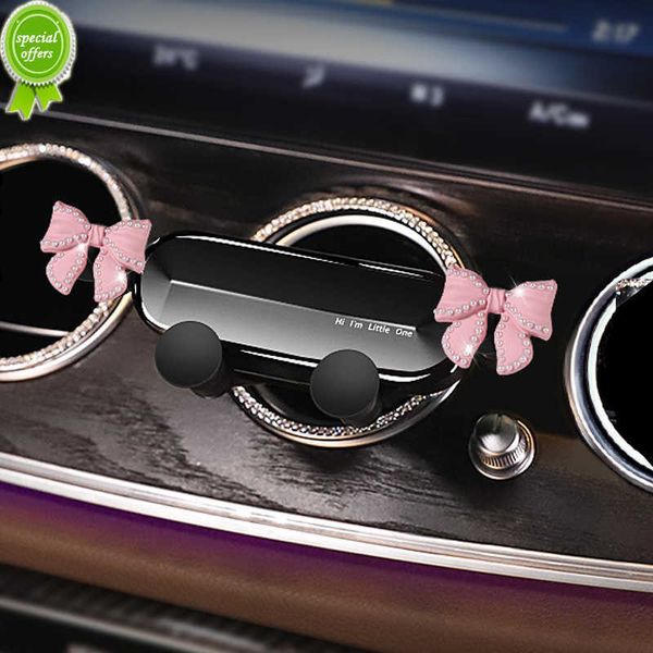 Novo suporte de telefone para carro universal com laço fofo, suporte para GPS com diamante de desenhos animados, suporte de gravidade, ventilação automática, clipe para montagem em suporte para celular