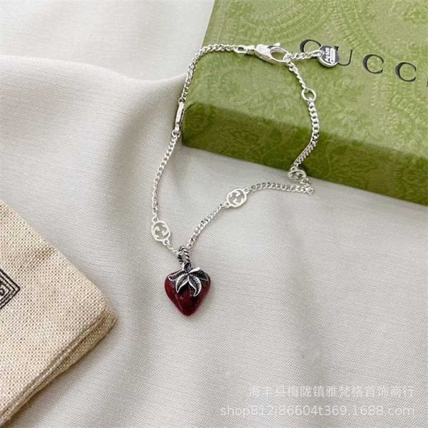 20% di sconto 2023 Nuova collana di gioielli firmati anello goccia colla rosso fragola BRACCIALE DONNA 925 bracciale pendente a forma di cuore intrecciato