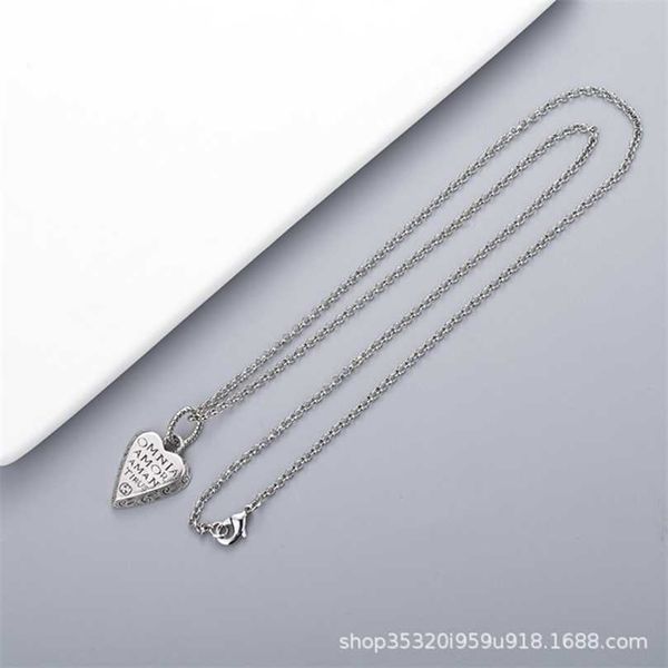 50% di sconto sul design dell'anello della collana del braccialetto dei gioielli Xiao stesso pendente d'amore in rame bianco antico dritto