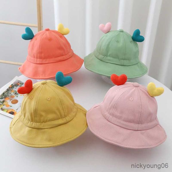 Accessori per capelli Autunno Inverno Cappelli per bambini Simpatici cappellini regolabili per orecchie a forma di cuore Tinta unita Outdoor Beach Boy Girl Cappellini da sole