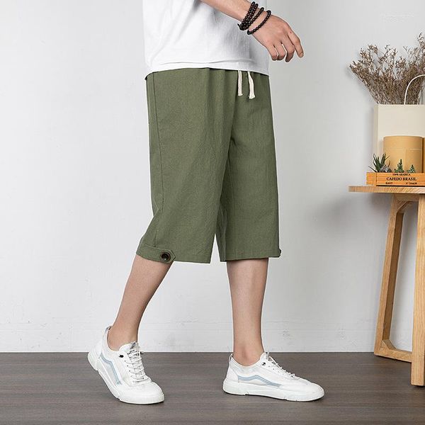 Calças masculinas curtas soltas tamanho grande de linho casual de algodão e shorts de praia de perna larga fina