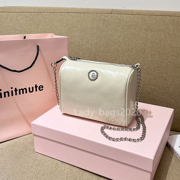 Bolsas Minitmute Travesseiro Bolsa Boston Bolsa de mão de grife feminina Couro real de luxo Bolsa de ombro transversal Bolsa de noite Bolsa tiracolo Mensageiro Bolsas cilíndricas