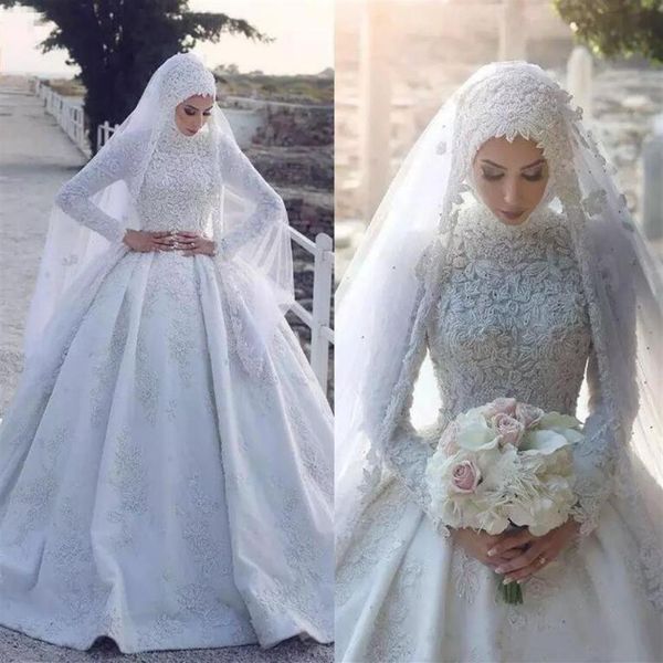 Splendidi abiti da sposa musulmani con applicazioni di pizzo e abiti da sposa 2018 Abiti da sposa a maniche lunghe con scollo a sbuffo in rilievo bianco arabo Dubai 2913