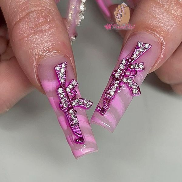 Decorazioni per nail art 10 pezzi Charms di lusso in lega rosa Gun Bunny DIY Glitter 3D Accessori per gioielli artigianali 230606