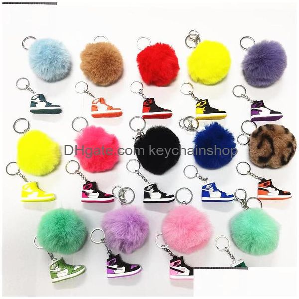 Chaveiros Lanyards 14 Cores Designer Mini Sile 3D Tênis Pompom Chaveiro Homens Mulheres Crianças Chaveiro Presente Sapatos Bolsa Cadeia Cesta Dhsut