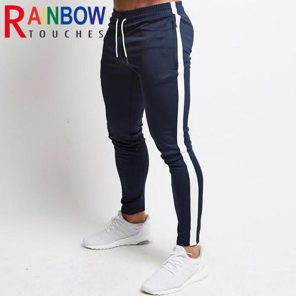 Pantaloni Pantaloni Fitness Uomo Nuovo Tessuto elasticizzato sottile Design vuoto Palestra Sport Pantaloni a matita Pantaloni sportivi da esterno Pantaloni da uomo Rainbowtouches