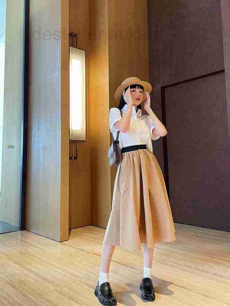 Designer de saias high-end 23 verão clássico corte tridimensional em forma de guarda-chuva saia grande cintura alta 7XHE