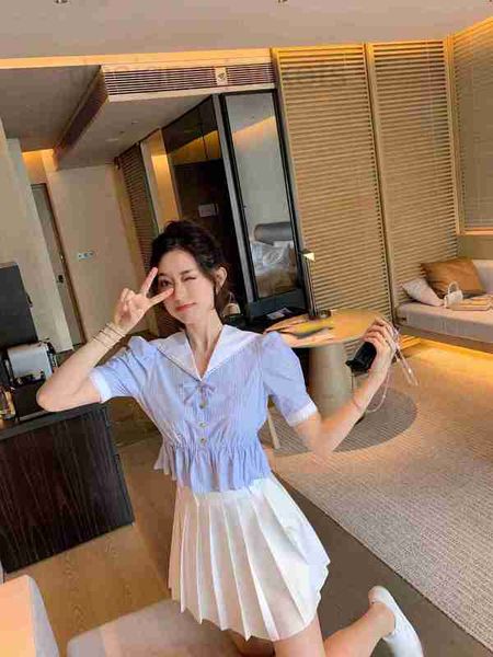 Kadınlar bluzlar gömlek tasarımcısı yüksek uç bahar/yaz kontrastlı lacivert mavi beyaz şerit bel dalgası kenarı gömlek cn9v