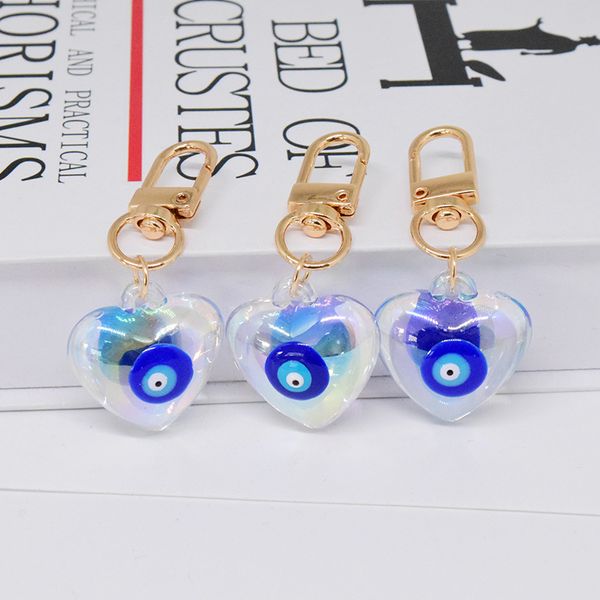 Novo Chaveiro Peach Heart Evil Eye Chaveiro para Mulheres Masculinas Laser Acrílico Blue Eye Bolsa Acessórios para Chaves do Carro