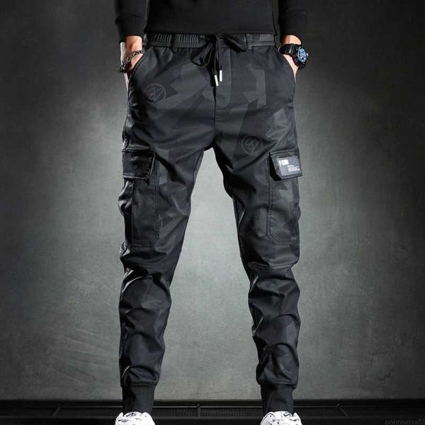 Pantaloni da uomo 2023 nuovi pantaloni della tuta da uomo Camouflage Elasticità Pantaloni cargo militari Coulisse Multi tasche Bottoms Pantaloni da jogging casual