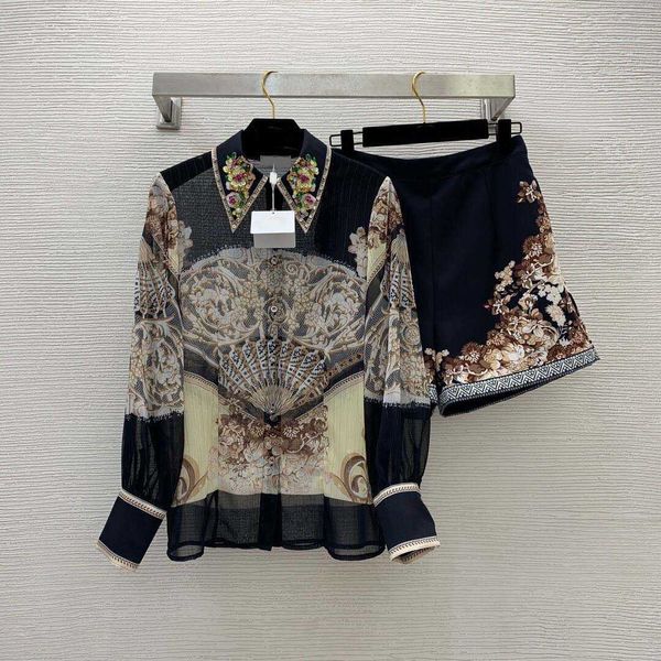 23ss Women Shorts устанавливает женскую дизайнерскую одежду в форме вентиляции с припечатками в форме вентиляции
