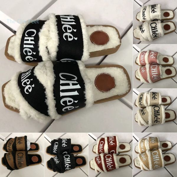 Дизайнерские роскошные бренды губки Slippers Классические плоские каблуки плюшевые зимние ленивые мультфильмы Большой головные шлебцы Леди Слэйды Женщины Длинные Флисовые пляжные тапочки