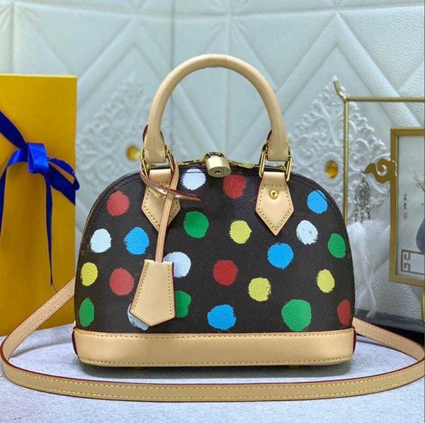 Moda Polka Dot Totes Bag Designer de bolsas de concha de couro genuíno Handle Polka Dot Crossbody Bags de alta qualidade Old Flower Shell Shoulder Bag Minority Handbag