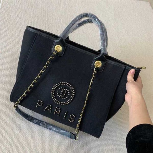 Borsa da sera in tela da donna con etichetta di lusso Pearl Beach Ch Borse grandi classiche Designer Zaino da donna Portatile di grande capacità Negozio di fabbrica D14u usa vendita