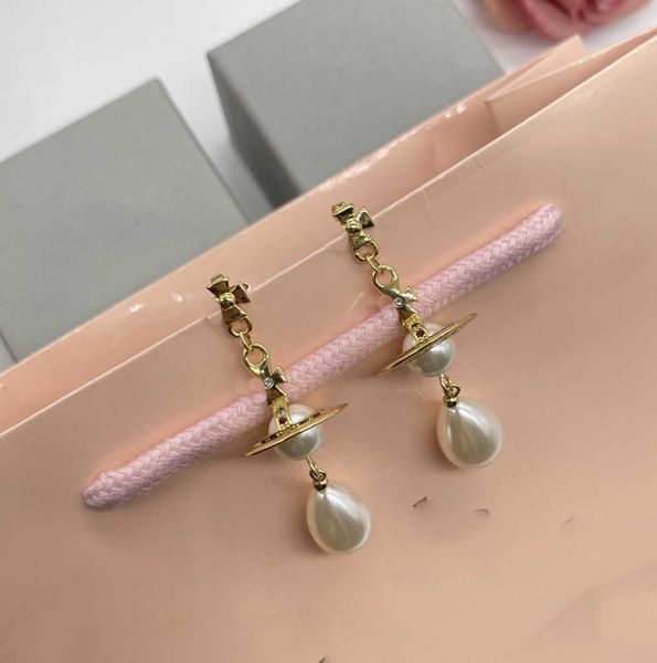 Orecchini a bottone firmati Vivian Luxury Women Fashion Jewelry Earing Metal Pearl Earring cjeweler Westwood Woman Tidal flow design 782ess