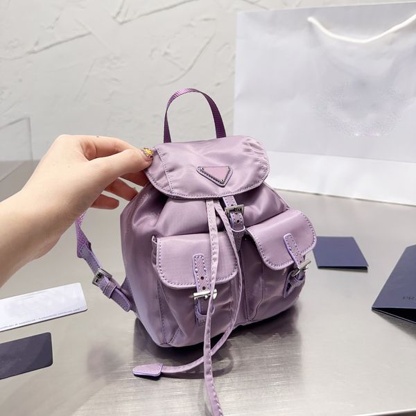 Erkek sırt çantası tasarımcısı kadın sırt çantaları gündelik spor paketleri klasik desen mini okul çantaları lüks deri çanta yüksek kalite