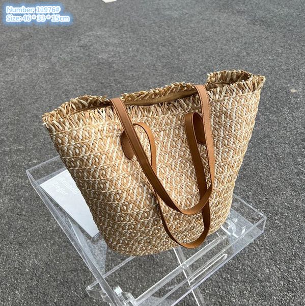 Atacado bolsas de ombro femininas 2 cores para viagens de férias de verão francesas, bolsa oca de palha de praia, mochila de tecido de grande capacidade, moda de rua, bolsa tote com borla