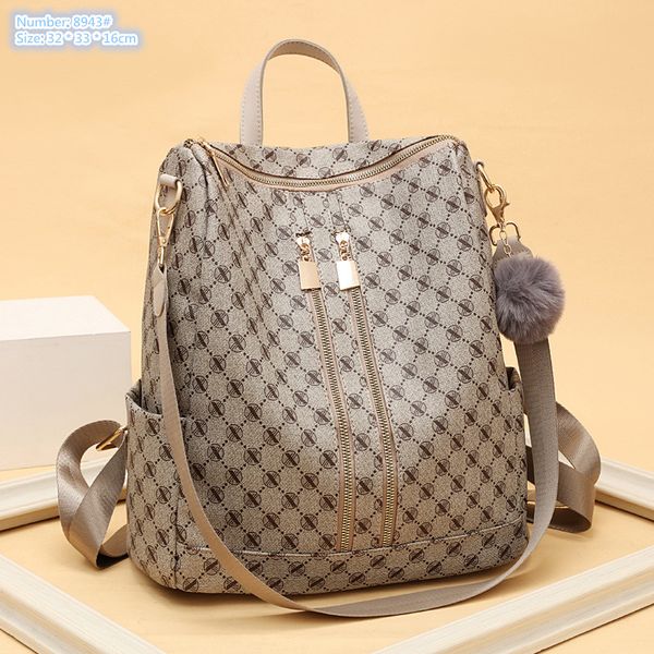 Atacado bolsas de ombro femininas 2 cores grande capacidade anti-roubo mochila de viagem com zíper duplo pingente de bola de pele doce bolsa de moda tendência contraste bolsa de couro