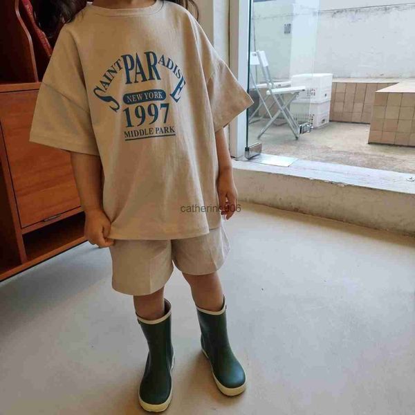 Nuova estate abbigliamento per bambini coreani bambina vestito a maniche corte per bambini sport casual sciolto ragazzo vestito a due pezzi 0-5 anni ba L230625
