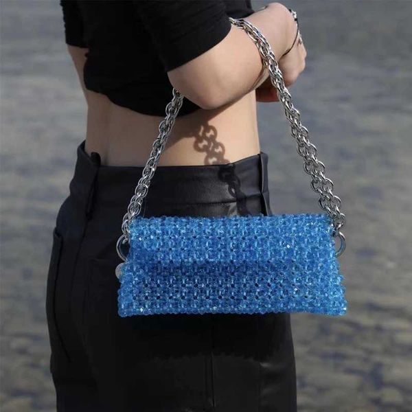 Borsa per cuscino ascellare in rilievo con fibbia magnetica con patta da donna alla moda Borsa tessuta estiva con tracolla a catena di alta qualità 230625