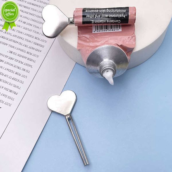 Novo metal manual pasta de dente espremedor de aço inoxidável distribuidor tubo espremedor de creme para as mãos tubo conjunto de rolos chave acessórios de banheiro