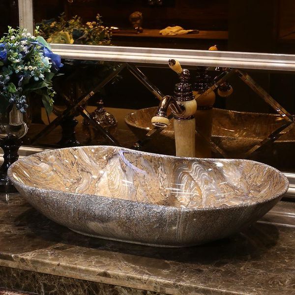 Имитация камней Европы винтажный стиль керамический арт -бассейн столочный столовый столовый бассейн ванная комната раковина керамический умывальник Qinqx