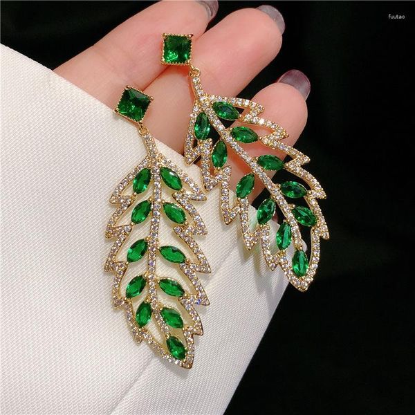 Серьги с серьгами eyer роскошная мода для женщин, сияющих хрустальных перьев в форме листья длинные 2023 года.