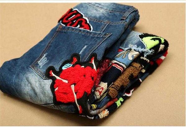 Vendita Patchwork Jeans Uomo New Skinny Fashion Biker Denim Pantaloni complessivi Abbigliamento casual da uomo