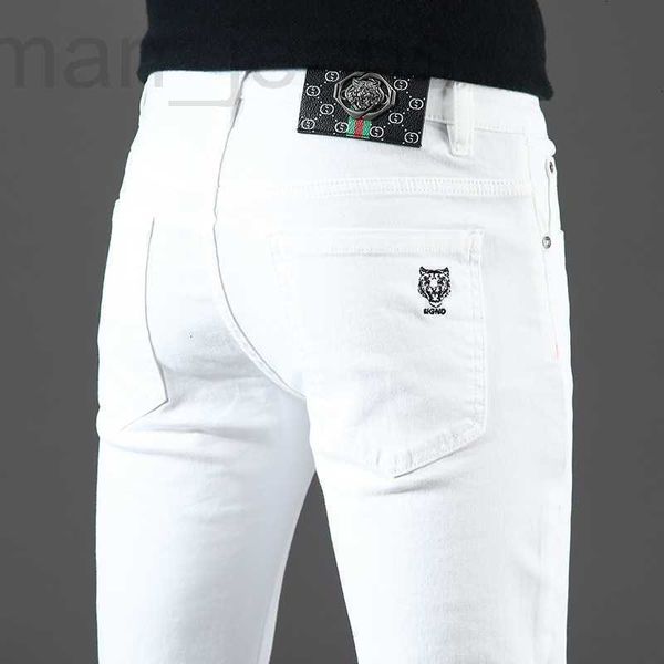 Designer de jeans masculino Broadcast of Live Guangzhou Xintang Cotton Bullet Versão coreana Slim Fit High End European Goods Black and White Tiger