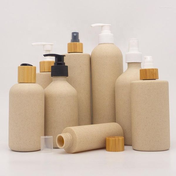 Bottiglie di stoccaggio all'ingrosso 100/250/300 / 400ML Pompa per shampoo in plastica con lozione di paglia di grano biodegradabile riciclata con coperchi in bambù Cylinde piatto