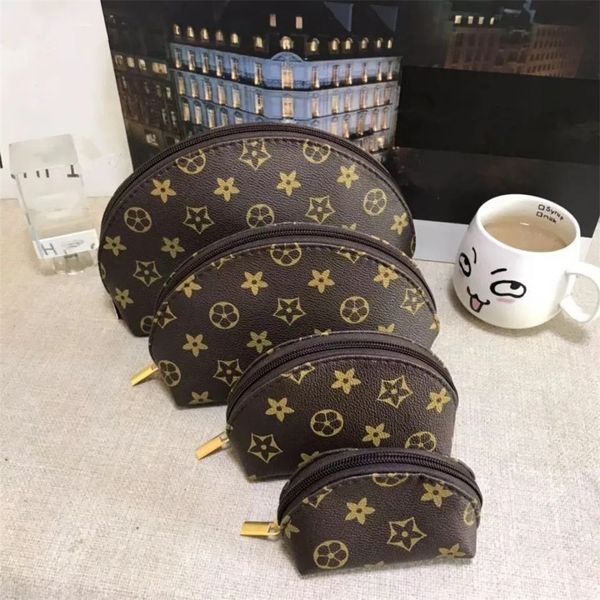 Alta qualidade 4 pçs / set designer novas mulheres sacos de cosméticos organizador famoso saco de maquiagem bolsa de viagem compõem senhoras cluch bolsas organizador saco de higiene