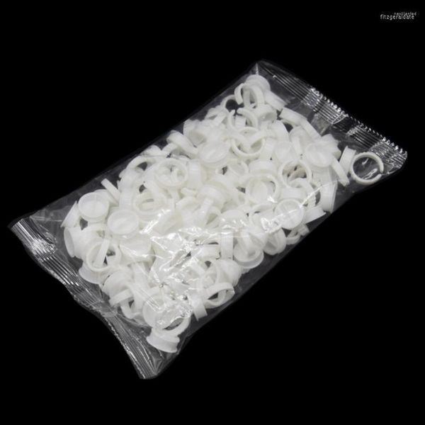 Inchiostri per tatuaggi 100pcs Anelli di inchiostro usa e getta bianchi Tazze S / L Sopracciglio Pigmenti per labbra Supporto per anello Contenitore Accessori per trucco permanente