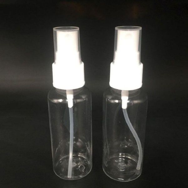 Stock PET Clear 50ml Bottiglie di profumo vuote Flacone spray portatile in plastica ricaricabile per viaggi con atomizzatore a nebbia Vendita calda nel mercato Ajoov