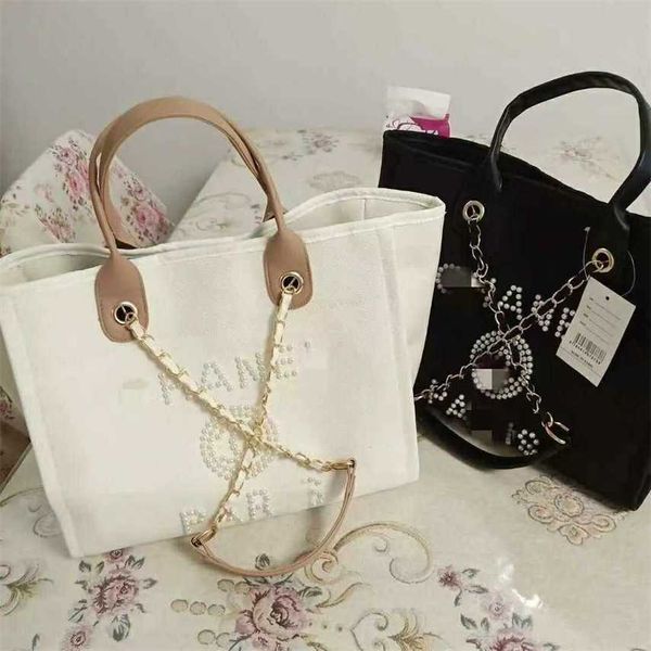 2023 Novo Xiangjia Pearl Beach Bag Bag Tote Bag Fashion INS One Shoulder Handheld Star Same Style 5UIY 50% Liquidação