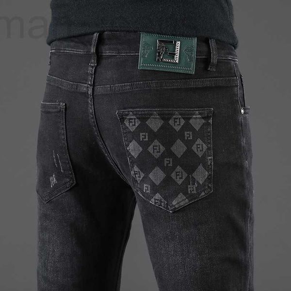 Designer de jeans masculino de Hong Kong Marca de moda europeia preto para ajuste fino, pés pequenos, outono e inverno novo elástico casual calças compridas masculinas K45U