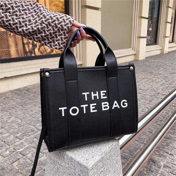 Bolsas tiracolo tipo bolsa de couro para mulheres 2023 Designer The Tote Bag Bolsas femininas Bolsas de ombro casuais Marcas Bolsas de compras 60% Venda de saída de fábrica XV8X