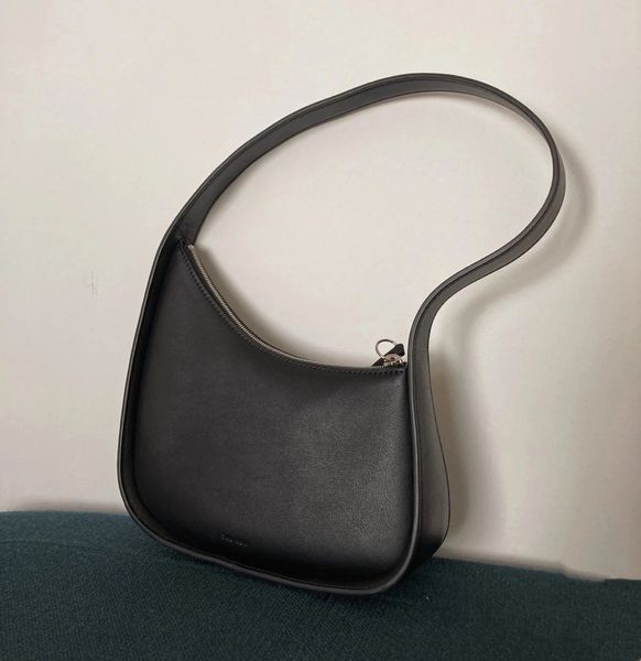 ünlü tasarımcı çantası klasik çok yönlü tote çanta kadın modası ile niş tasarım çanta düz renk premium deri banliyö koltuk altı omuz çantası