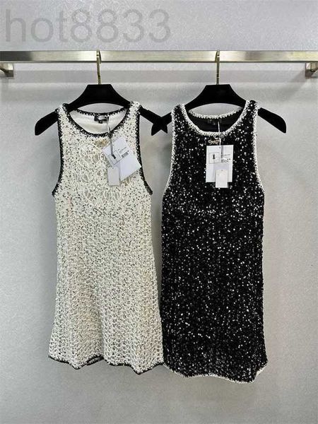 Vestidos casuais básicos de estilista verão novo estilo de celebridade indústria pesada lantejoulas borboleta tricô vestido estilingue para mulheres 0NZW