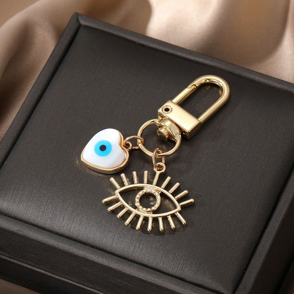 Weiße Muschel-Evil-Eye-Wimpern-Schlüsselanhänger, Schlüsselanhänger, Handtasche, dekorieren, Schmuck für Frauen, Geschenk
