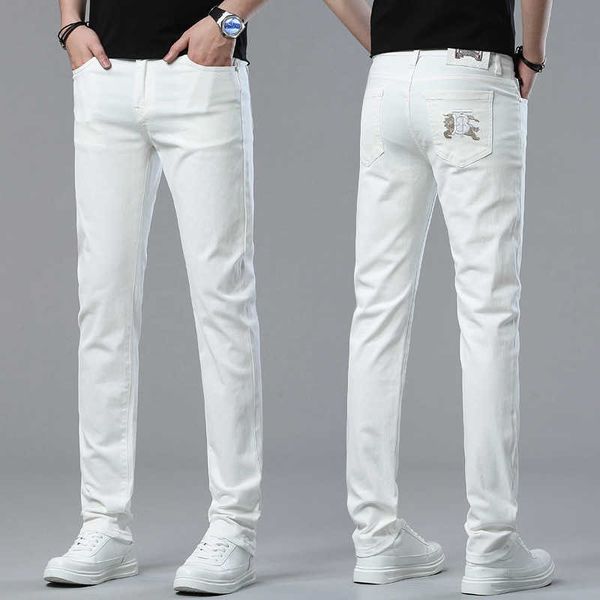 Jeans masculino designer primavera/verão novo para luz luxo edição coreana pés elásticos finos ajuste fino algodão bala antimanchas branco b calças parentais 8dxr