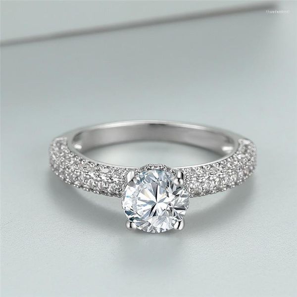Alianças de casamento de zircônia branca quatro garras anel solitário na moda cor prata cristal de luxo pedra redonda noivado para mulheres homens