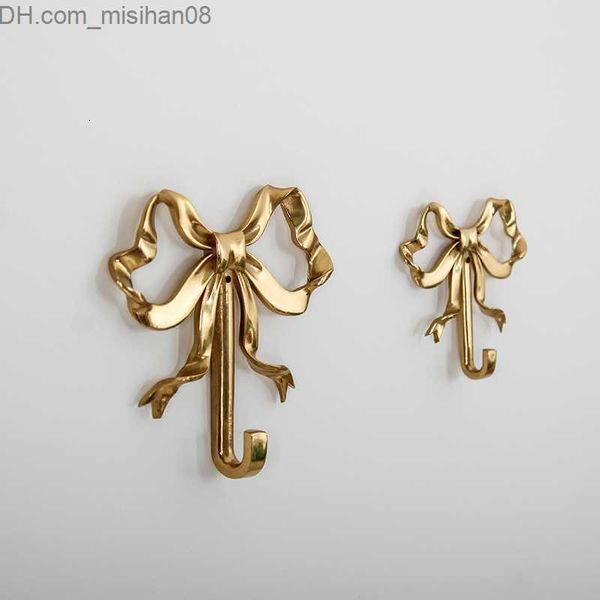 Ganchos Trilhos Ganchos Trilhos Golden Bowknot Cobre Banheiro Casaco Toalheiro Sala de Estar Pano de Fundo Exibição Moderna Decoração de Casa 230327 Z230630