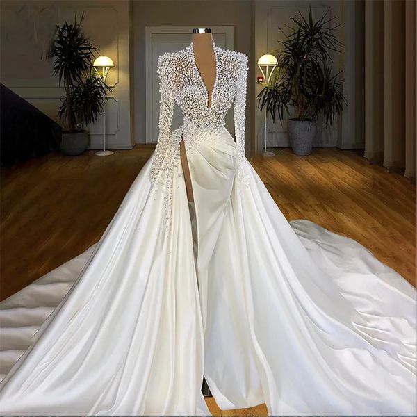 Perlenbesetztes schweres Perlenkleid Meerjungfrau Illusion V-Ausschnitt Langarm Brautkleider Sweep Zug Muslimisches Dubai Hochzeitskleid High Couture