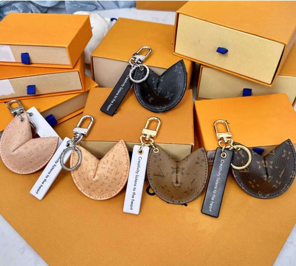 Accesorios de moda nuevos cordones bolsa de galleta de la fortuna llavero colgante de coche joyería con dije de flor mujeres hombres regalos moda PU llavero de cuero accesorios Compra caliente